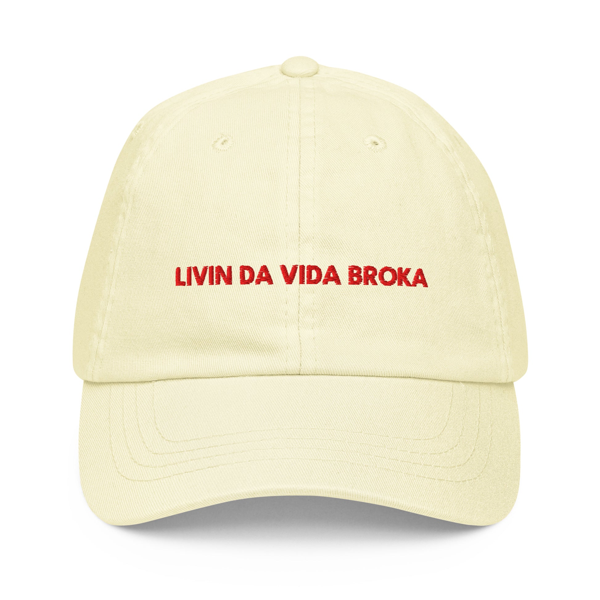 Pastel Lemon embroidered baseball cap, front view (embroidery mockup currently reads "LIVIN DA VIDA BROKA" — misspelling, pending corrected artwork)